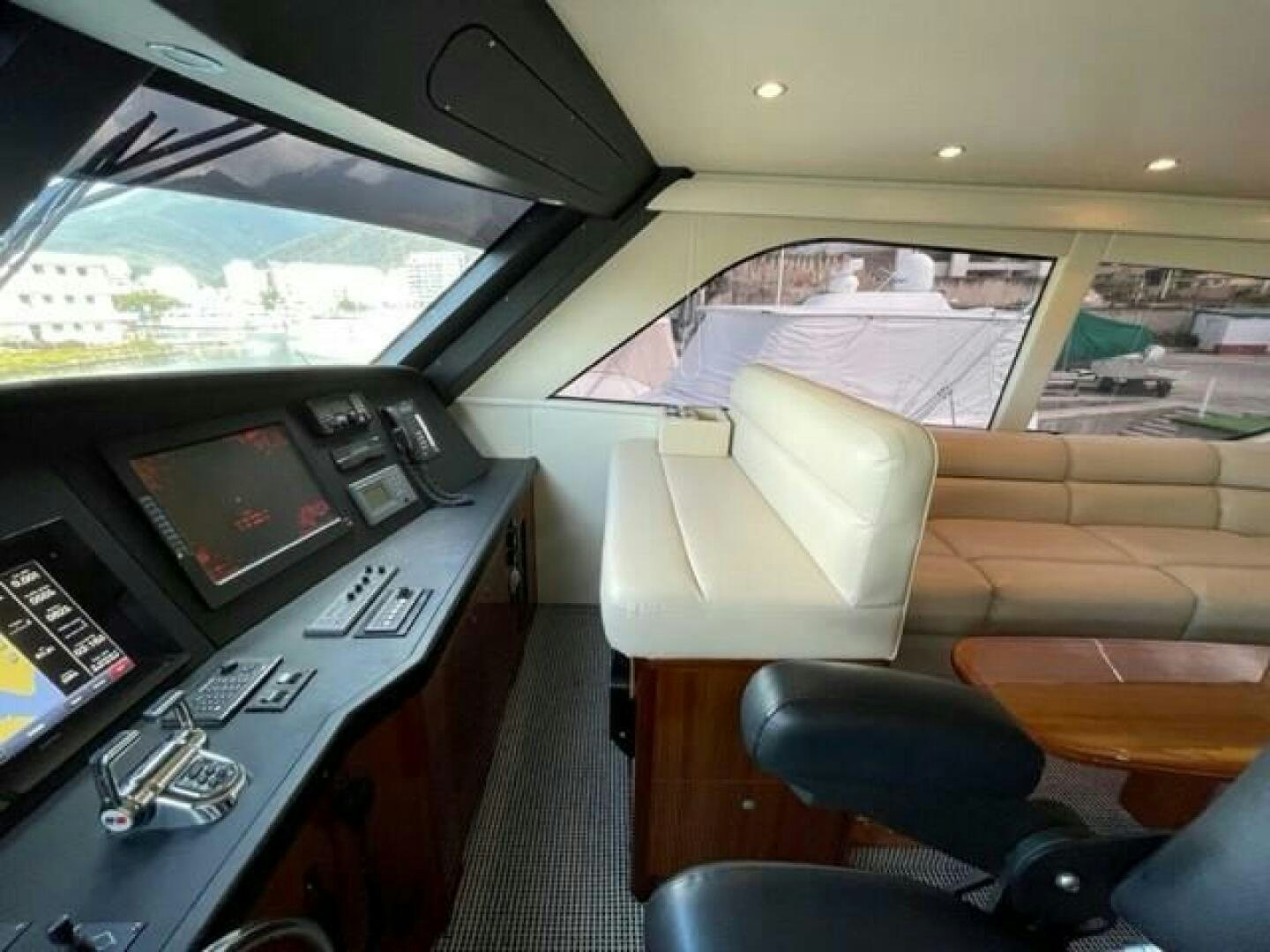 inside of a car aboard 6 C Yacht for Sale