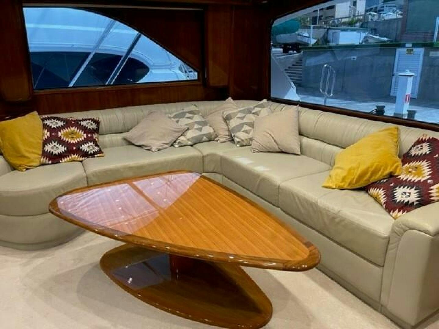 a couch with a coffee table aboard 6 C Yacht for Sale