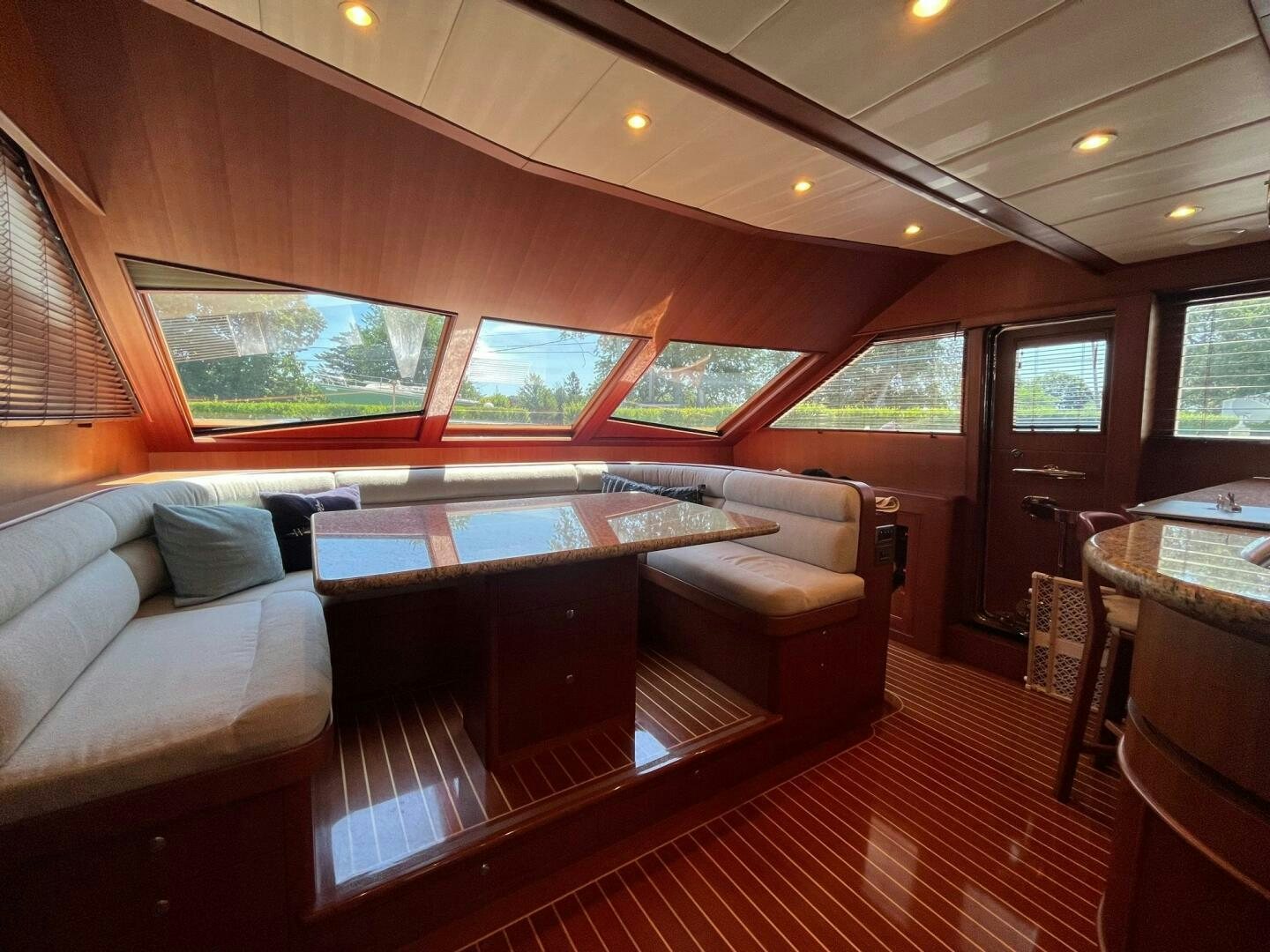 a room with a couch and a table aboard SIG:PRN Yacht for Sale