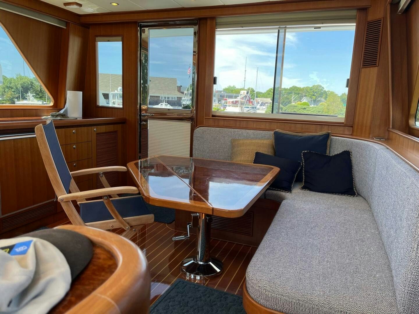a living room with a couch and a table aboard SIG:PRN Yacht for Sale