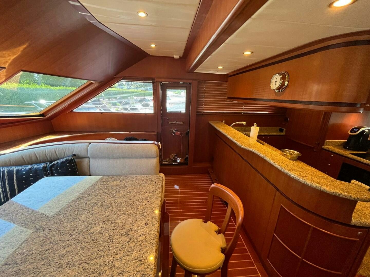 a bedroom with a bed and a couch aboard SIG:PRN Yacht for Sale