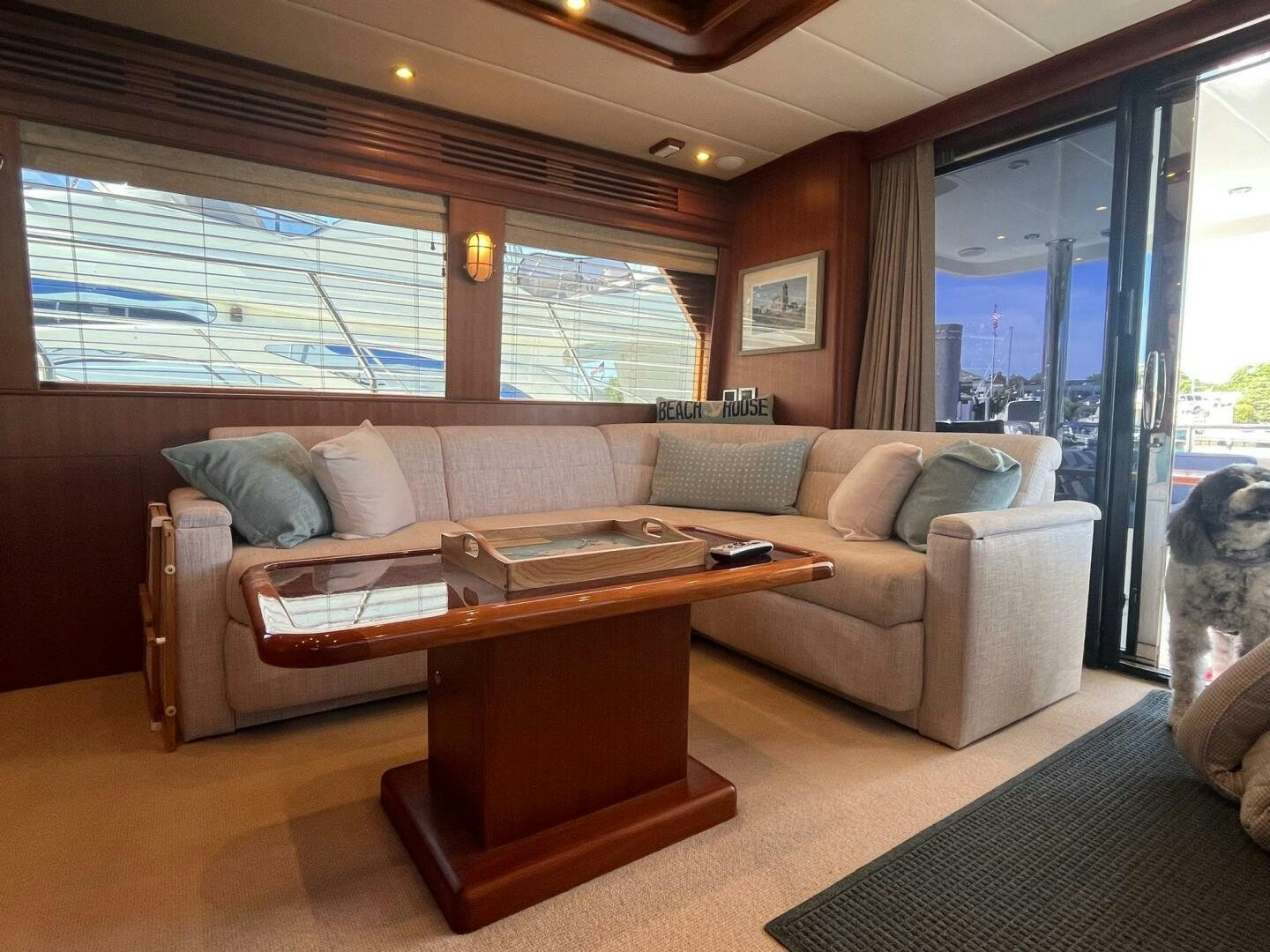 a living room with a couch and a coffee table aboard SIG:PRN Yacht for Sale