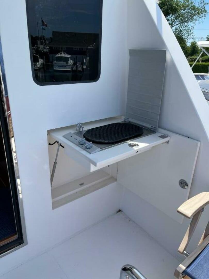 a white machine with a black keyboard aboard SIG:PRN Yacht for Sale