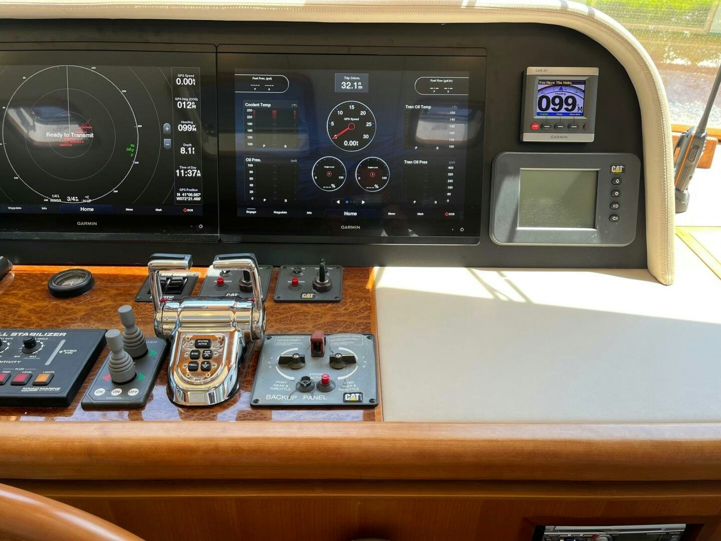 a group of electronic devices on a table aboard SIG:PRN Yacht for Sale