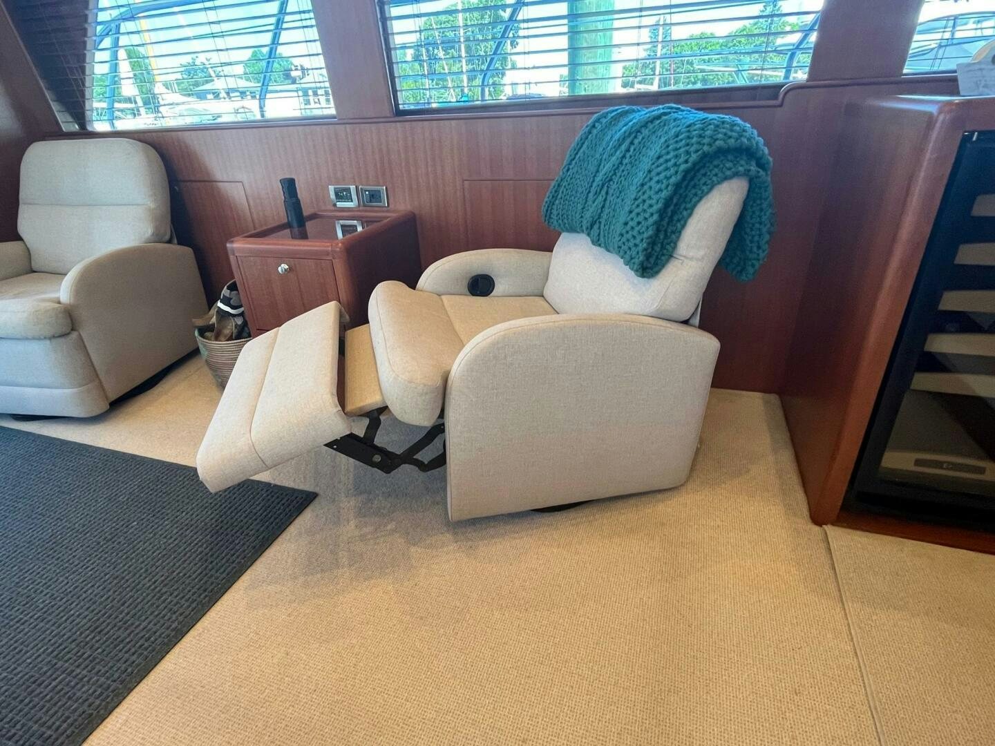 a room with couches and a table aboard SIG:PRN Yacht for Sale