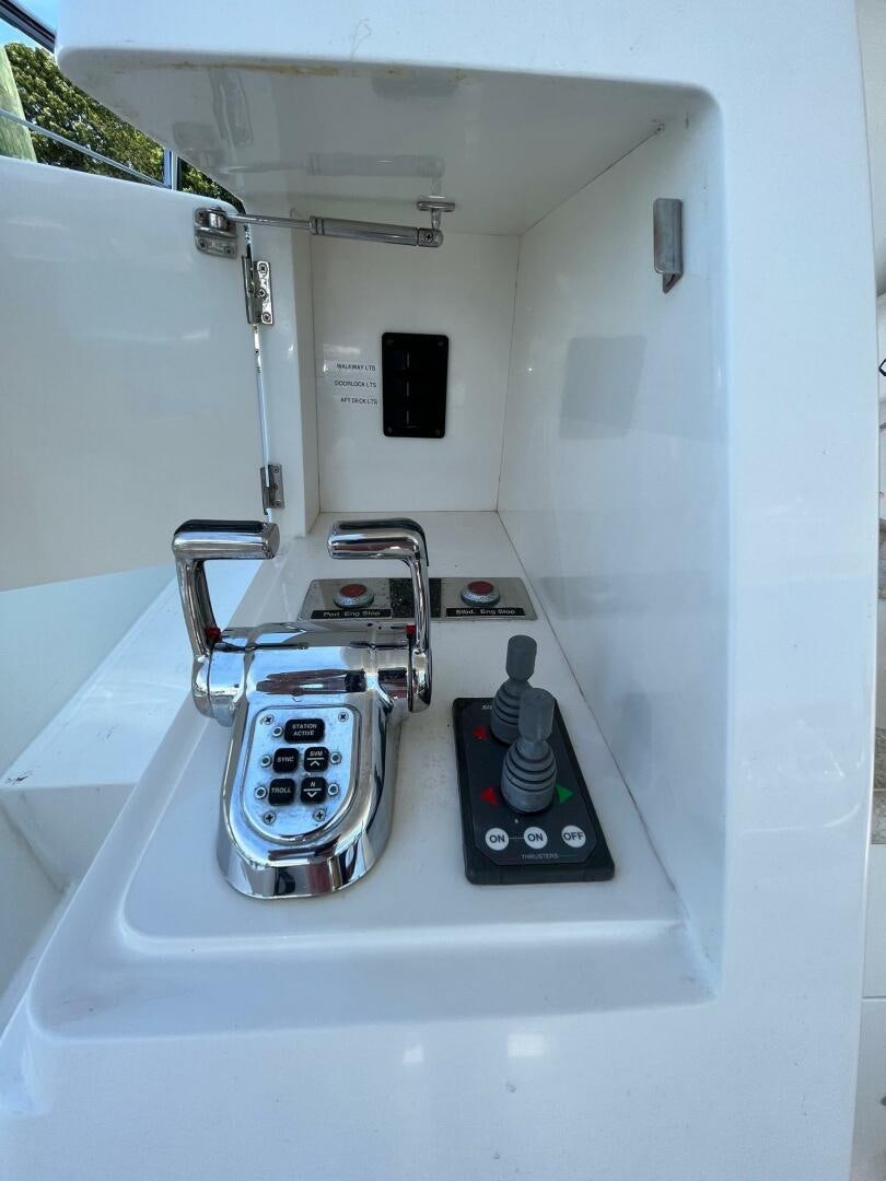 a white machine with a black dial aboard SIG:PRN Yacht for Sale