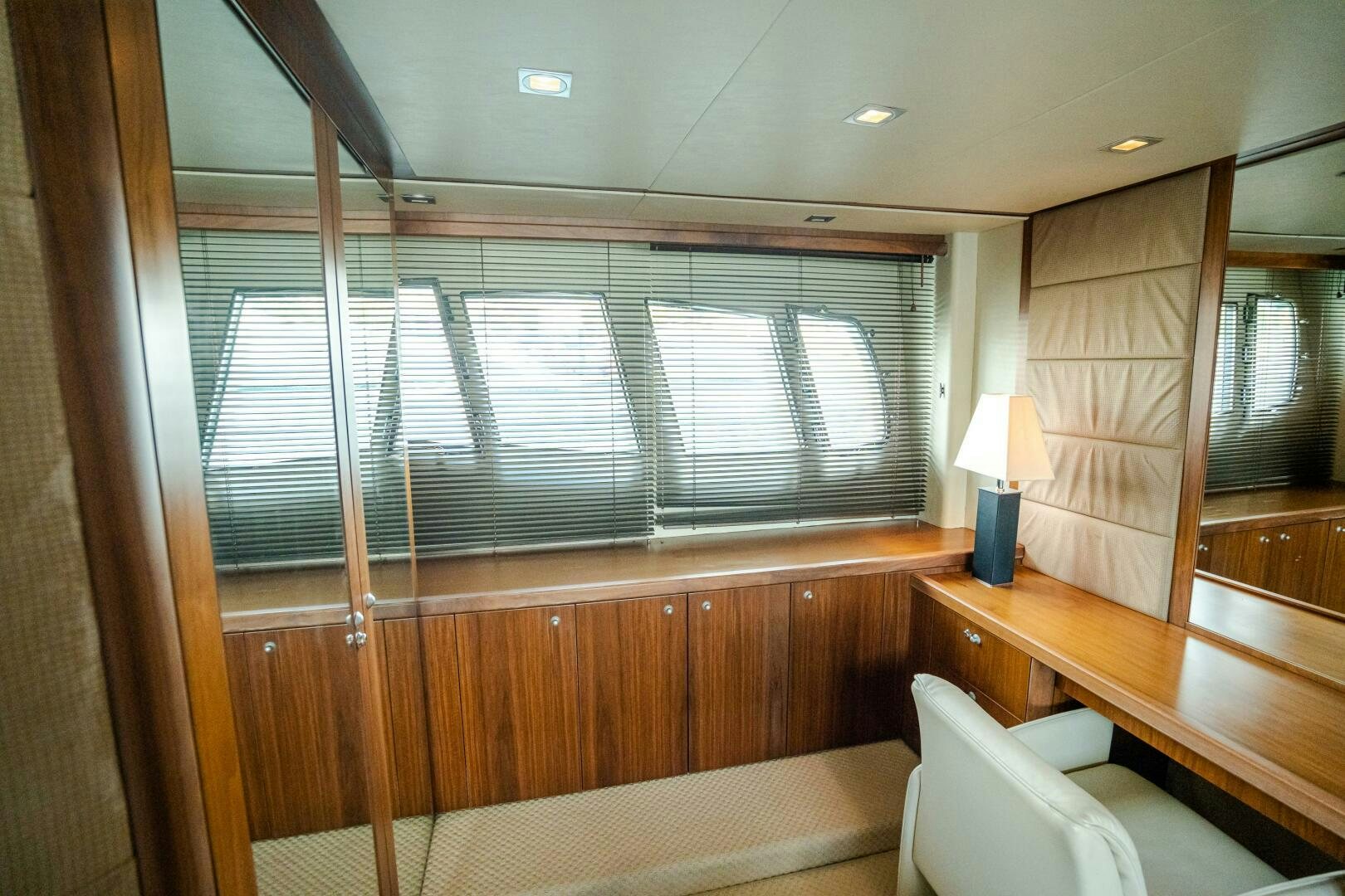 a room with a bed and a window aboard BAR&CO Yacht for Sale