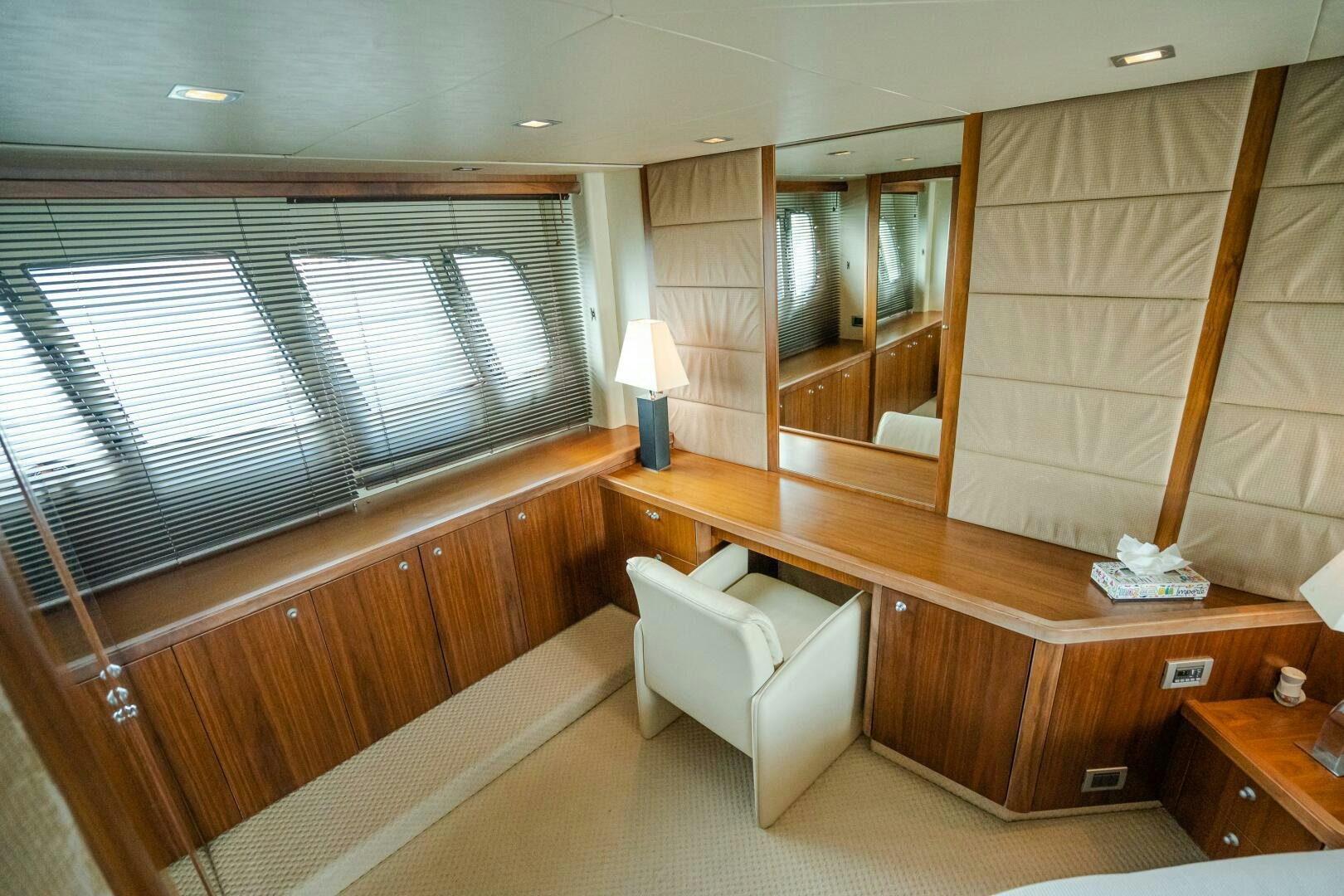 a room with a bed and a desk aboard BAR&CO Yacht for Sale