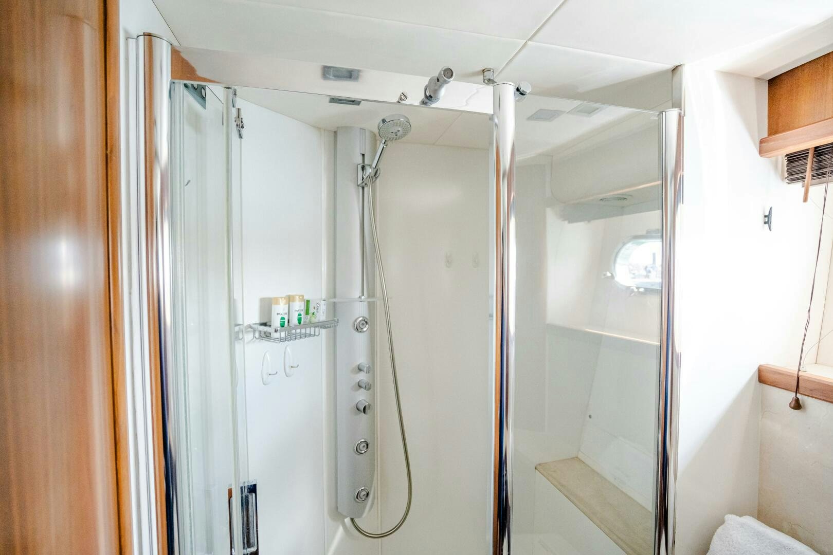 a room with white cabinets aboard BAR&CO Yacht for Sale