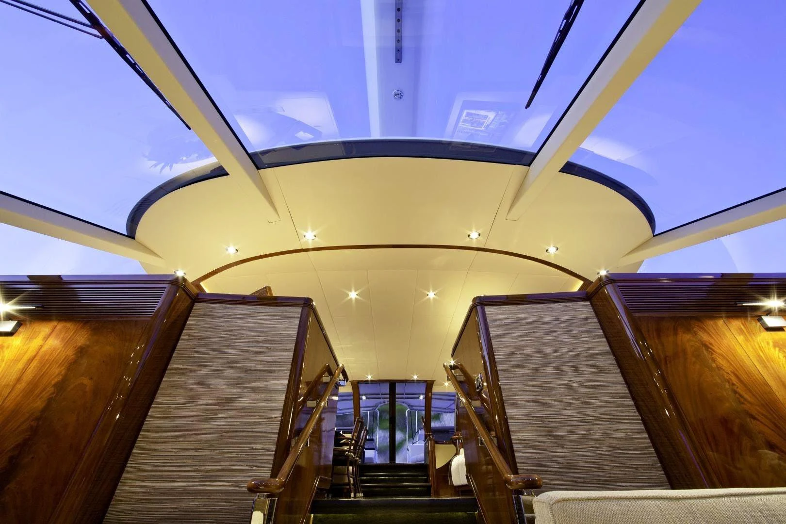 a large building with a staircase aboard DESTINATION Yacht for Sale