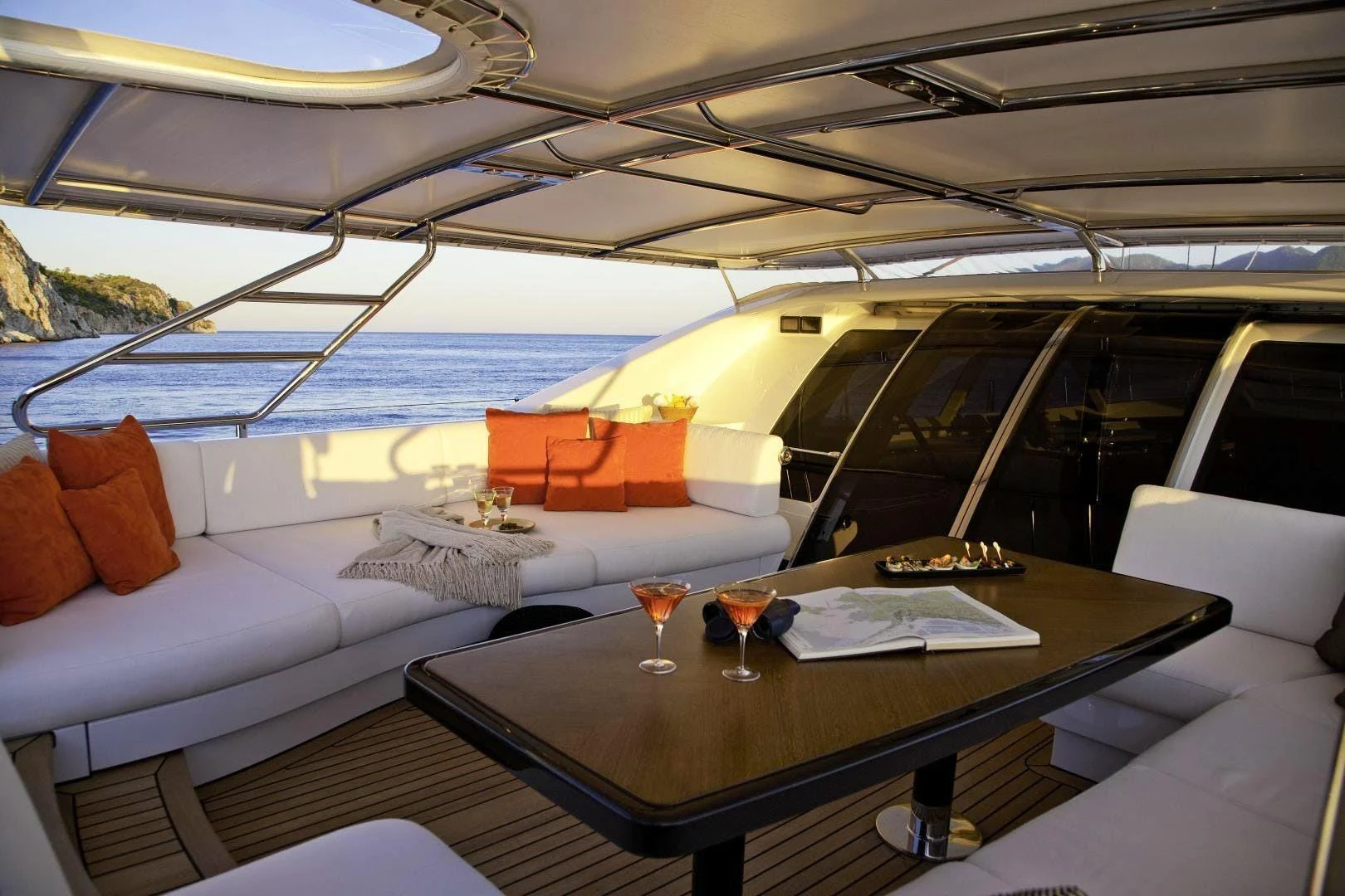 a room with a table and chairs aboard DESTINATION Yacht for Sale