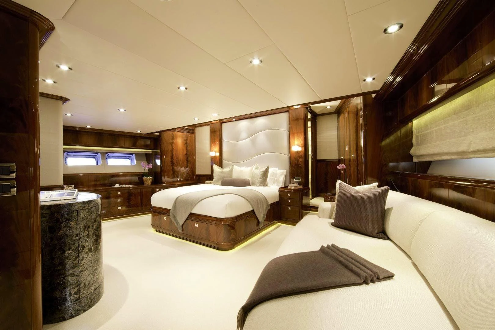 a hotel room with a bed aboard DESTINATION Yacht for Sale
