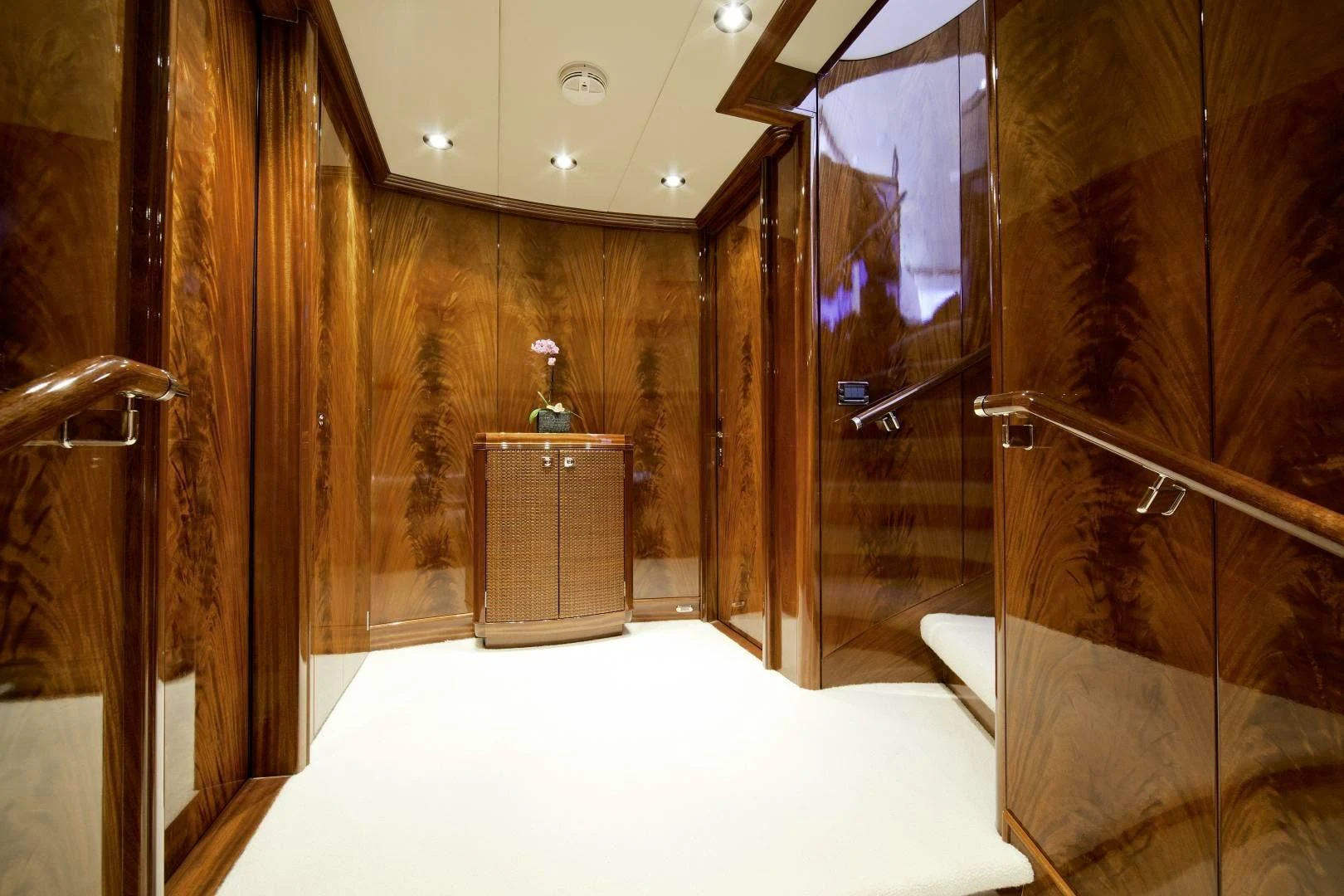 a bathroom with a glass shower aboard DESTINATION Yacht for Sale
