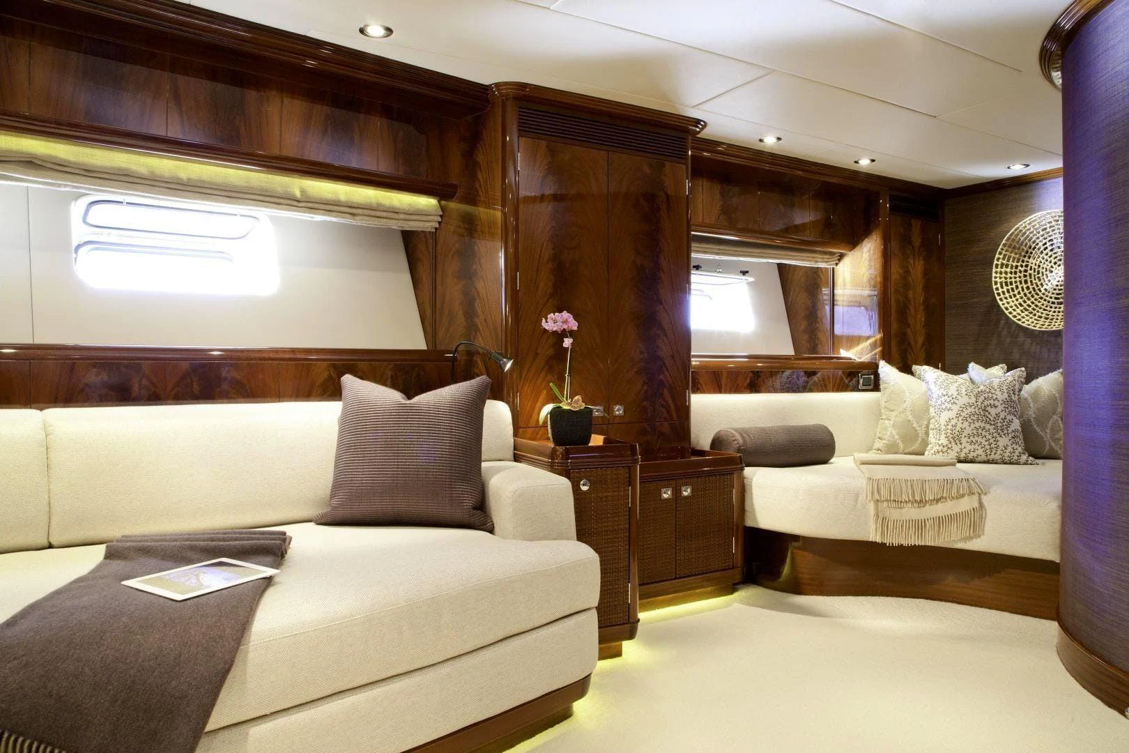 a room with a couch and a table aboard DESTINATION Yacht for Sale