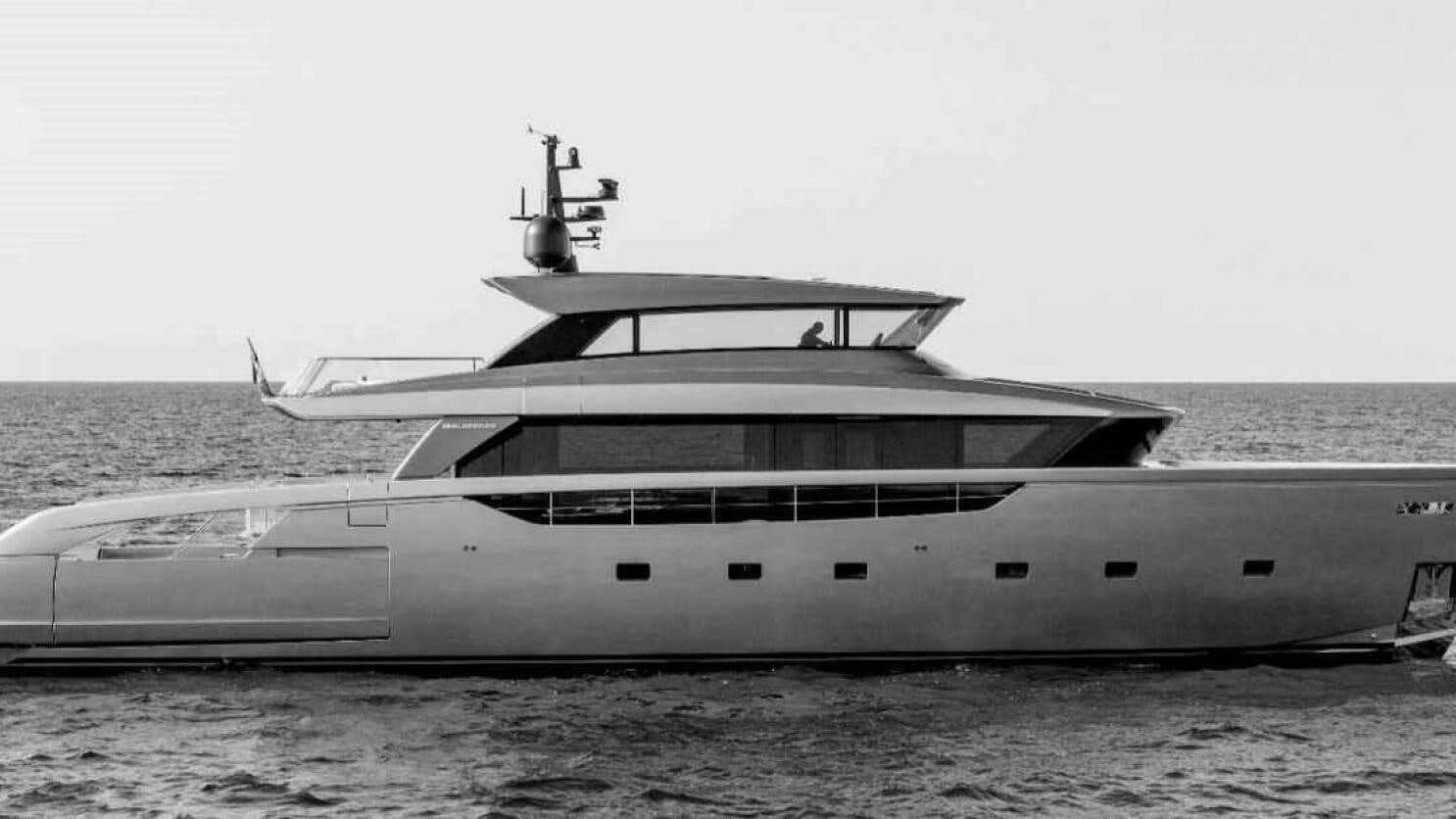 a black and white photo of a boat on the water aboard SX100 Yacht for Sale