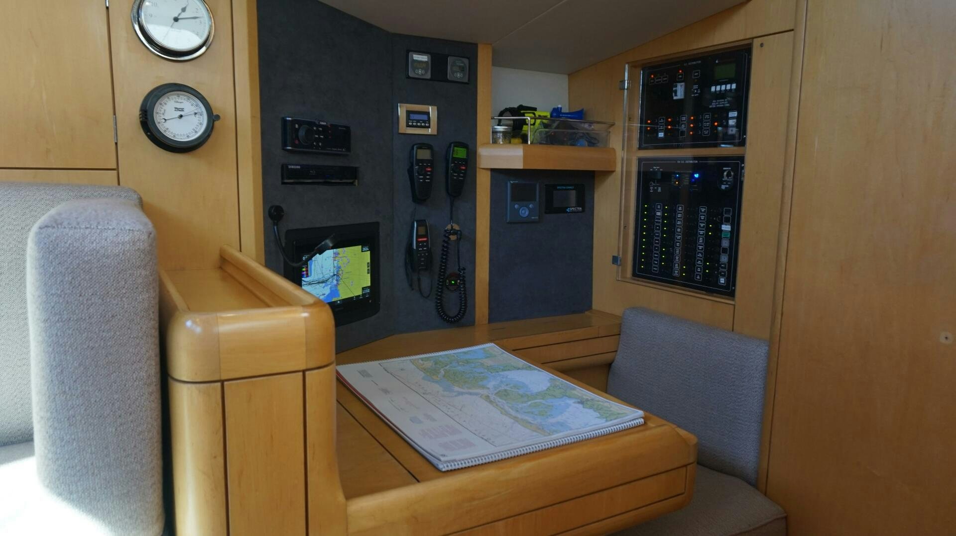 a room with a table and chairs aboard DOLCE VITA Yacht for Sale