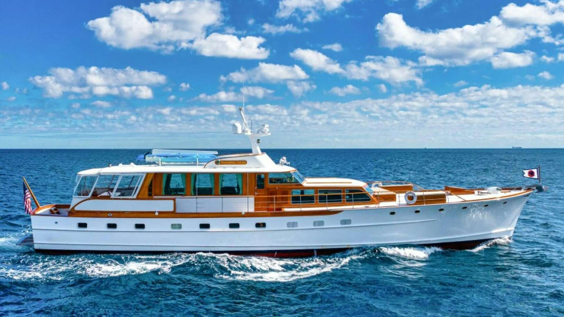a boat on the water aboard WISHING STAR Yacht for Sale