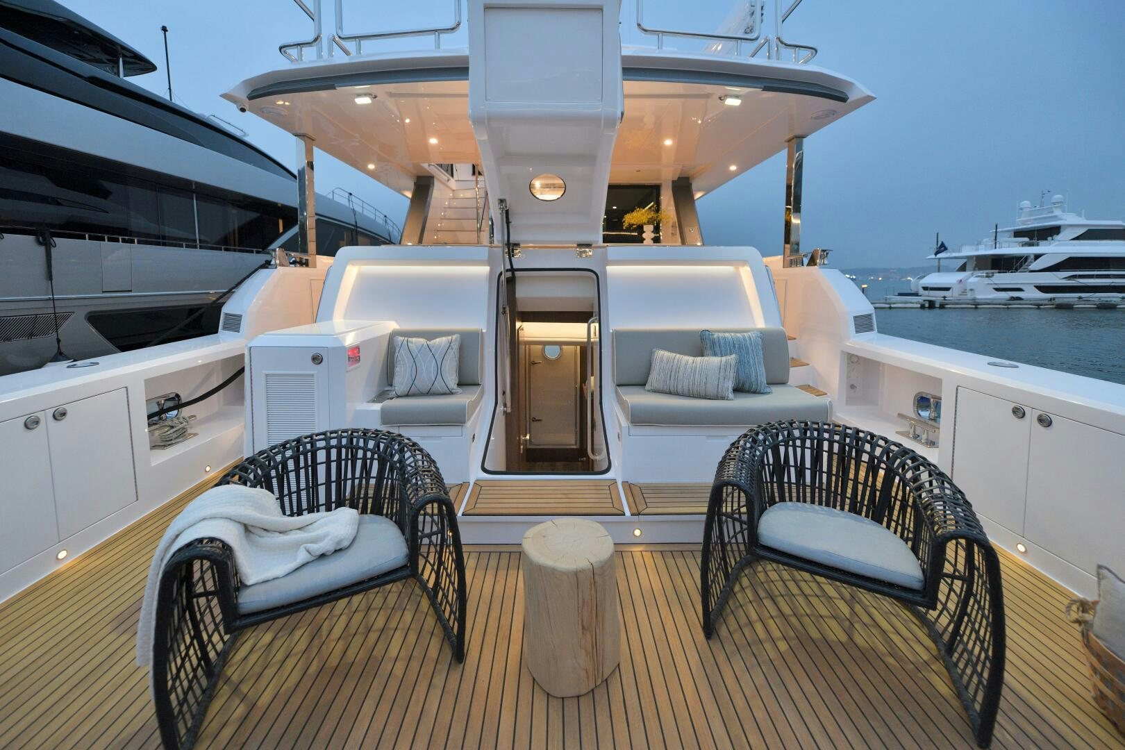 a kitchen with a table and chairs aboard V77S 610 Yacht for Sale