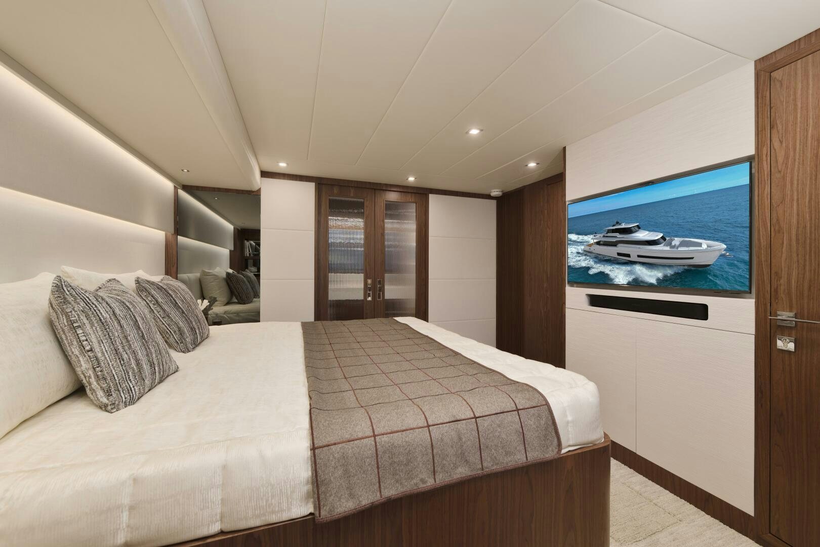 a bedroom with a large bed aboard V77S 610 Yacht for Sale