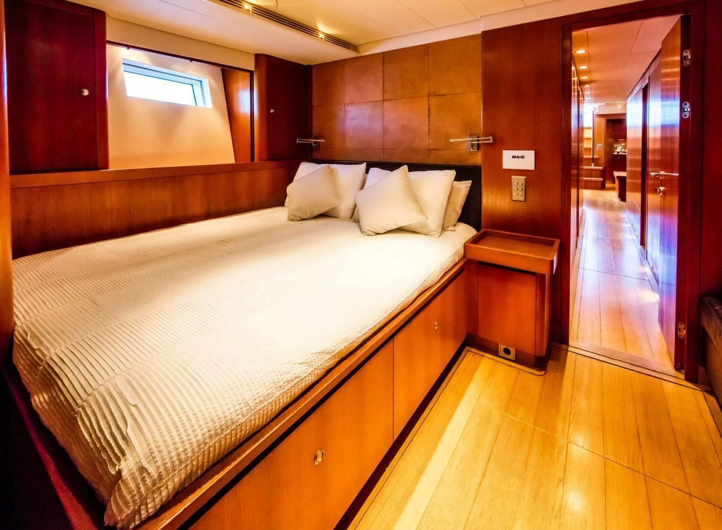 a bed in a room aboard HOPPETOSSE Yacht for Sale