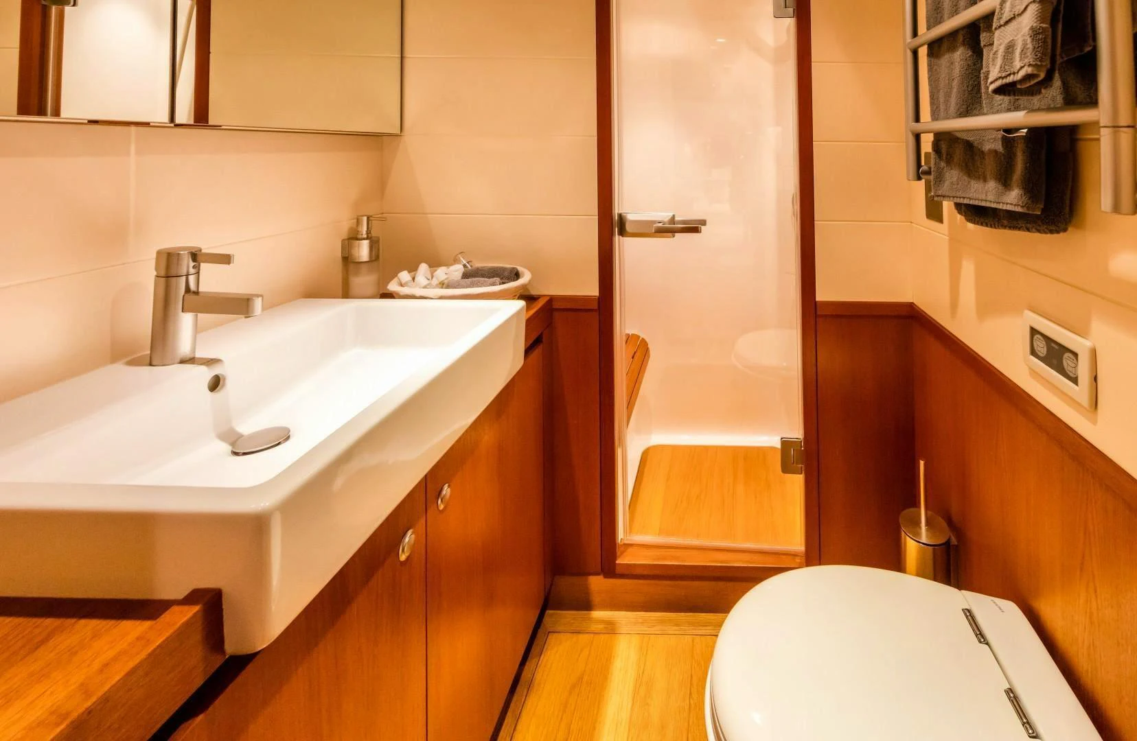 a bathroom with a sink and a toilet aboard HOPPETOSSE Yacht for Sale