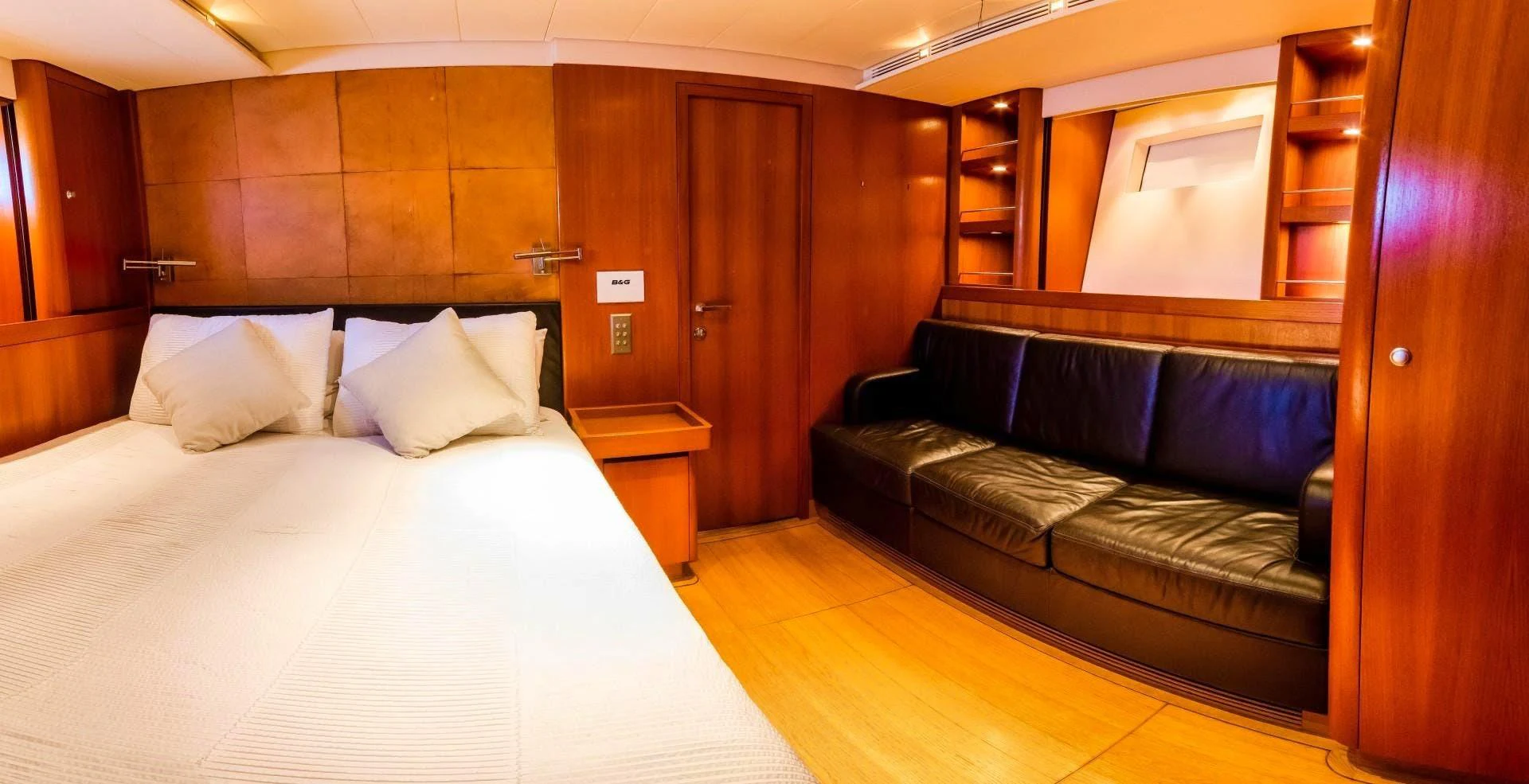 a bed in a room aboard HOPPETOSSE Yacht for Sale