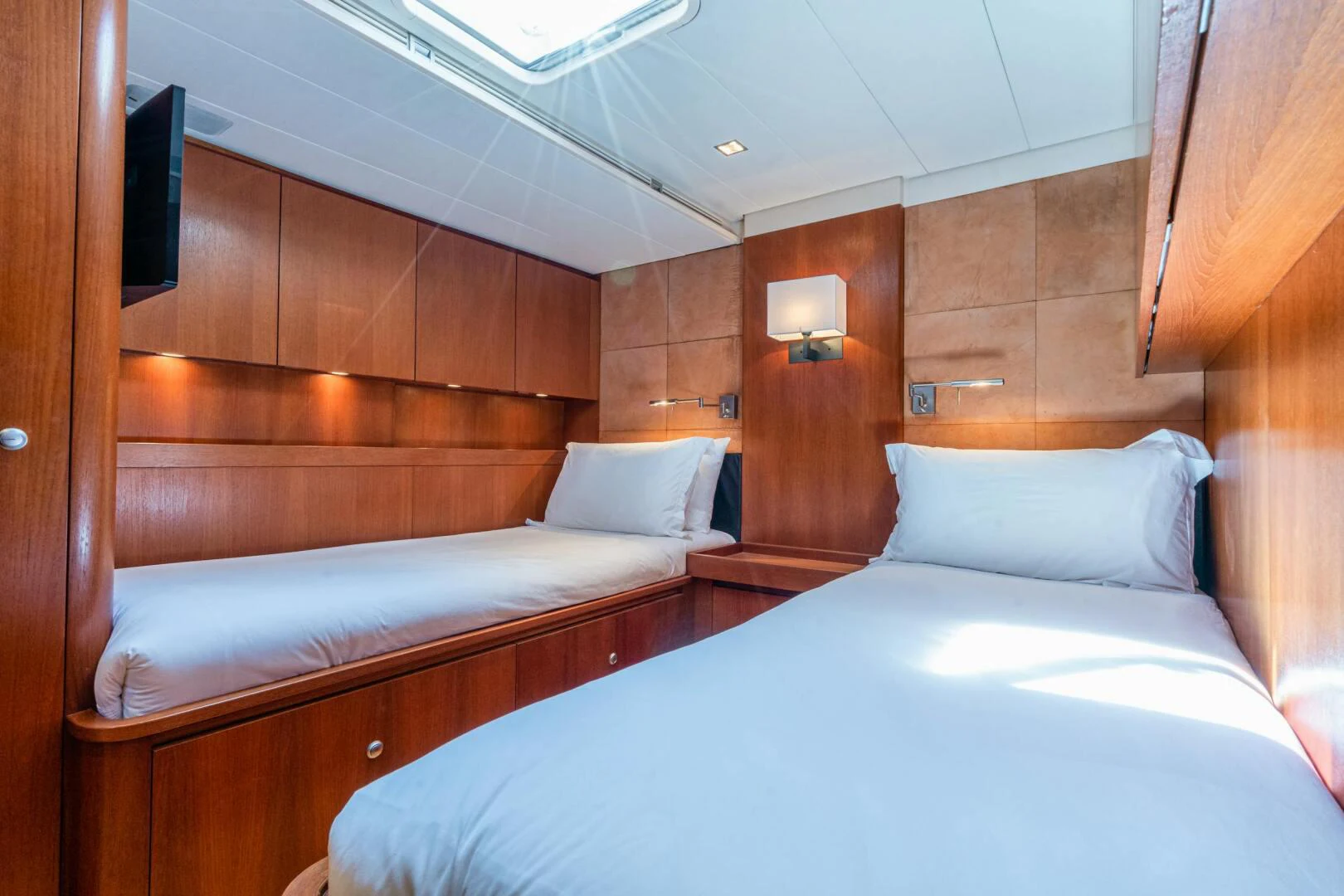 a room with two beds aboard HOPPETOSSE Yacht for Sale