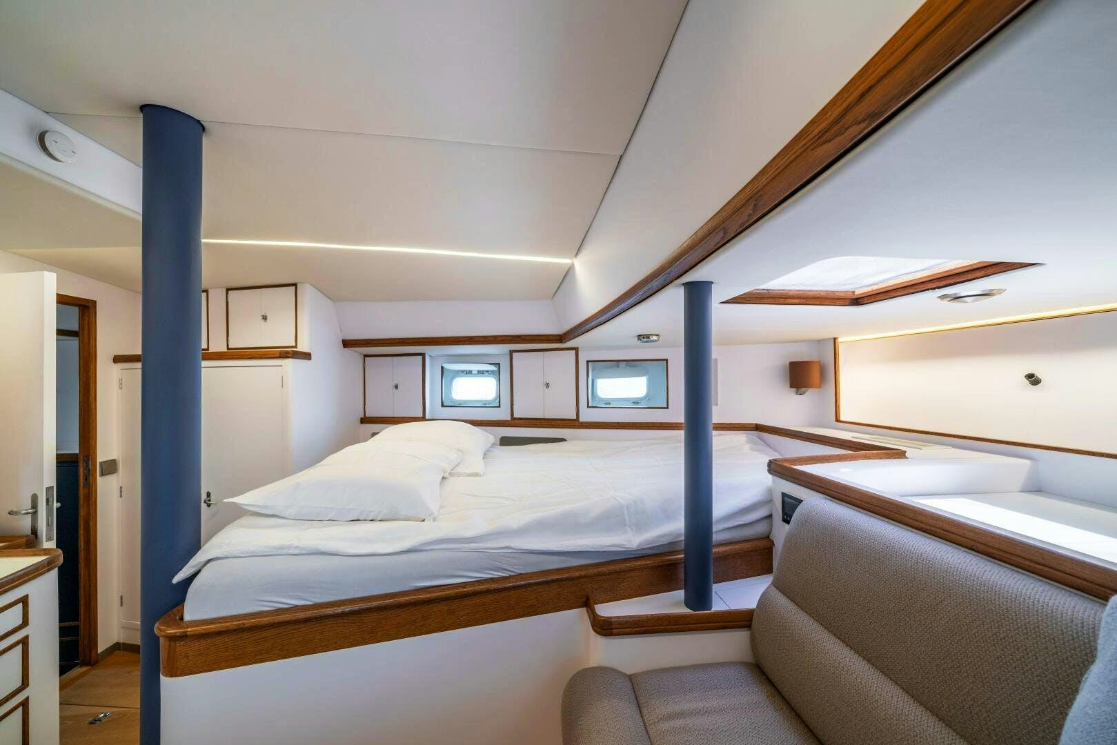 a room with bunk beds aboard ALTAIR Yacht for Sale