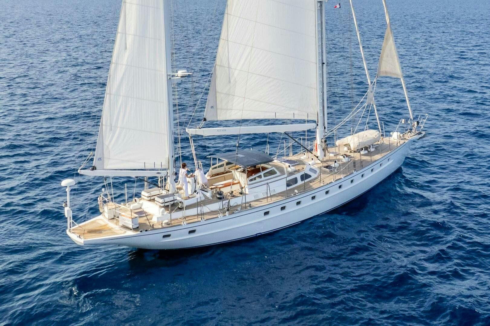 a large white boat on the water aboard ALTAIR Yacht for Sale