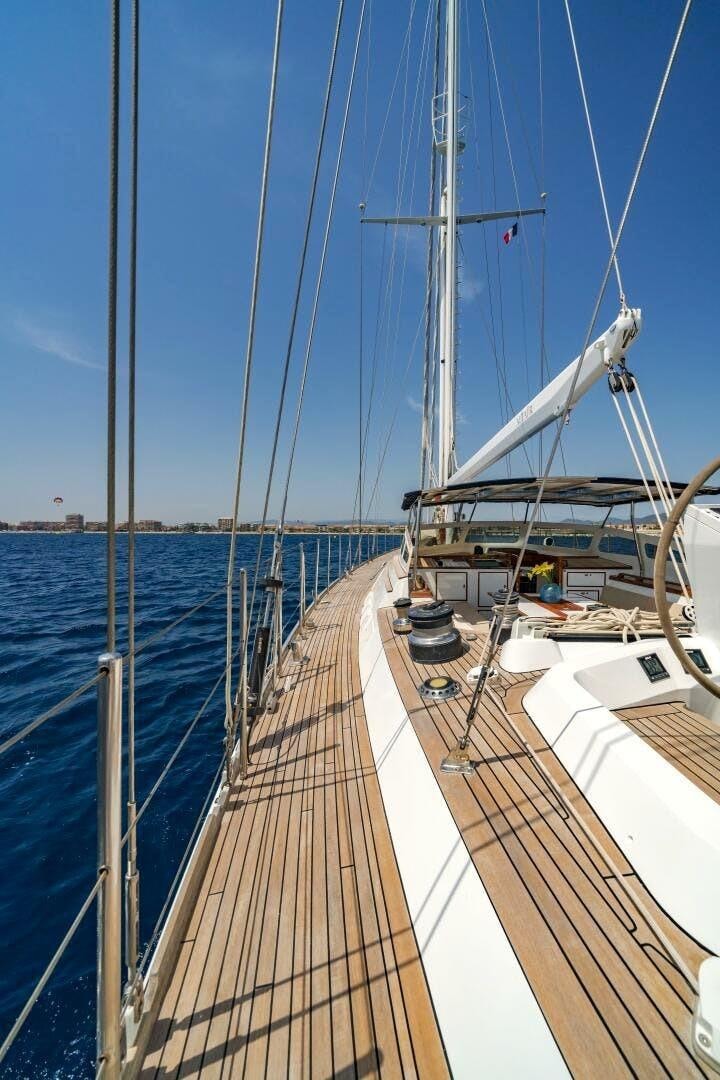 a boat dock with a sail aboard ALTAIR Yacht for Sale