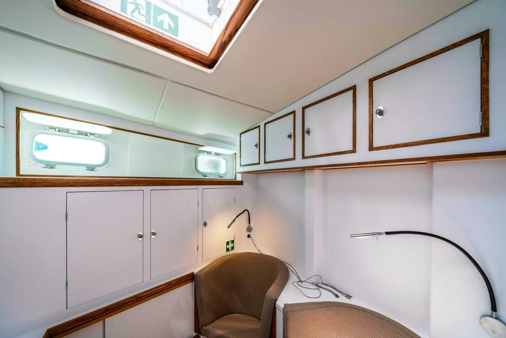 a room with a desk and a chair aboard ALTAIR Yacht for Sale