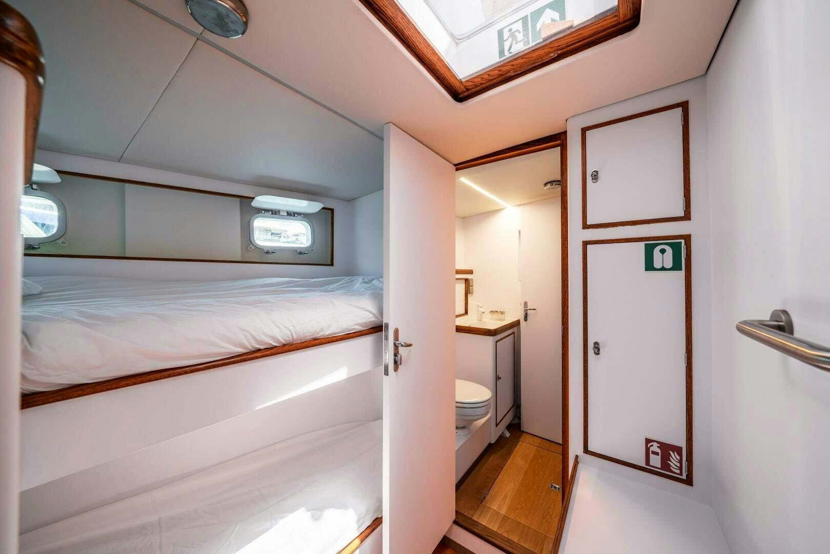 a bathroom with a large bed aboard ALTAIR Yacht for Sale