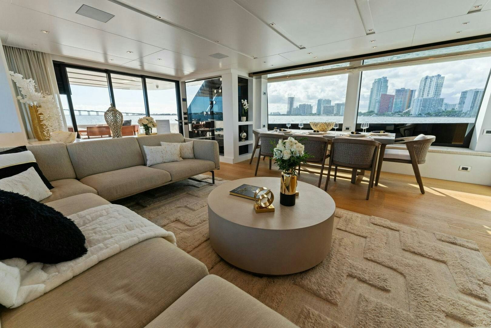a living room with a large window aboard GATSBY Yacht for Sale