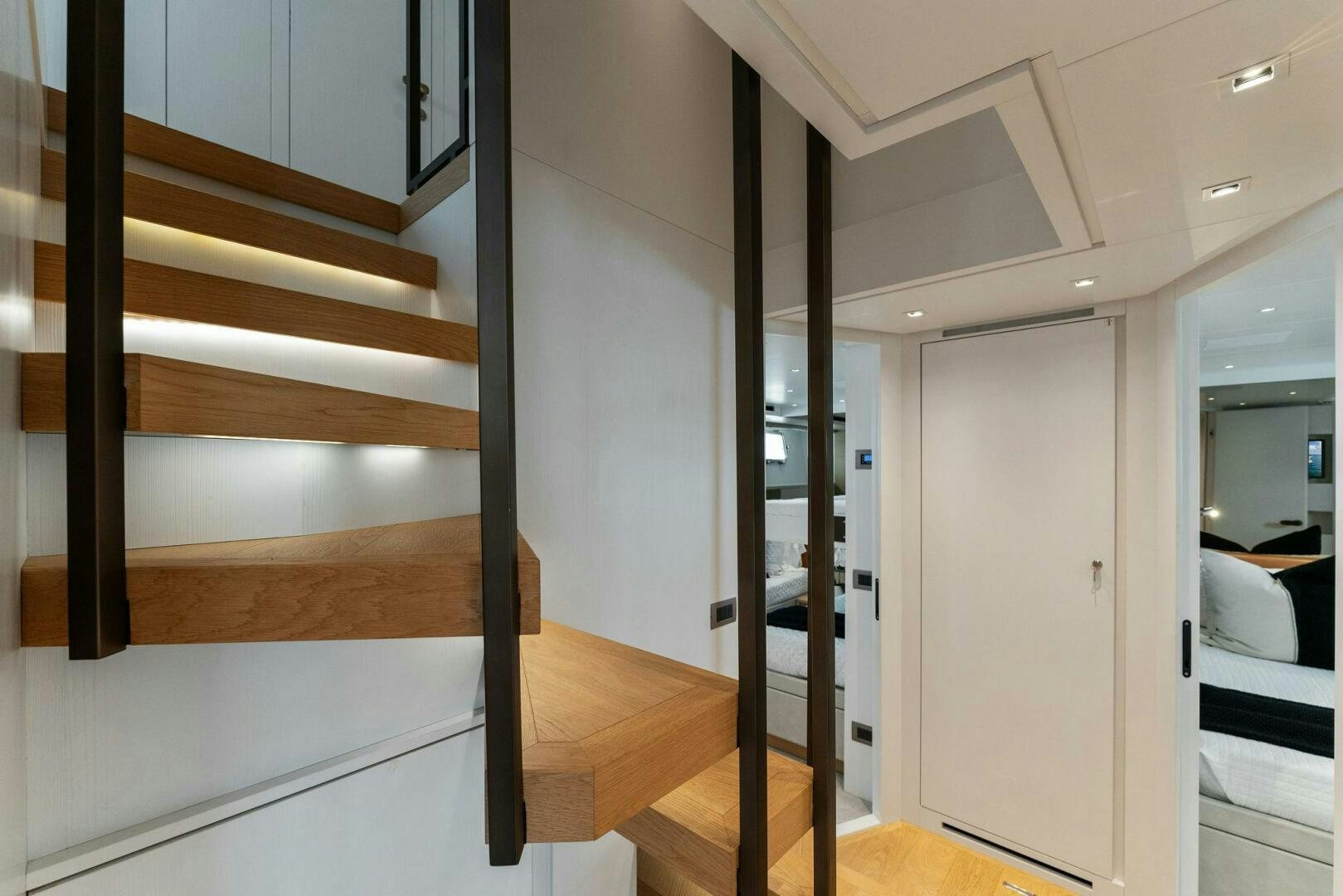 a room with a staircase and a door aboard GATSBY Yacht for Sale