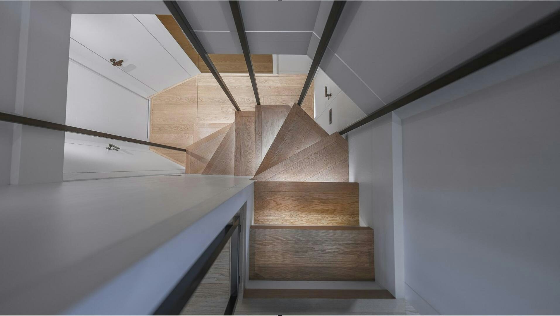 a set of wooden stairs aboard GATSBY Yacht for Sale