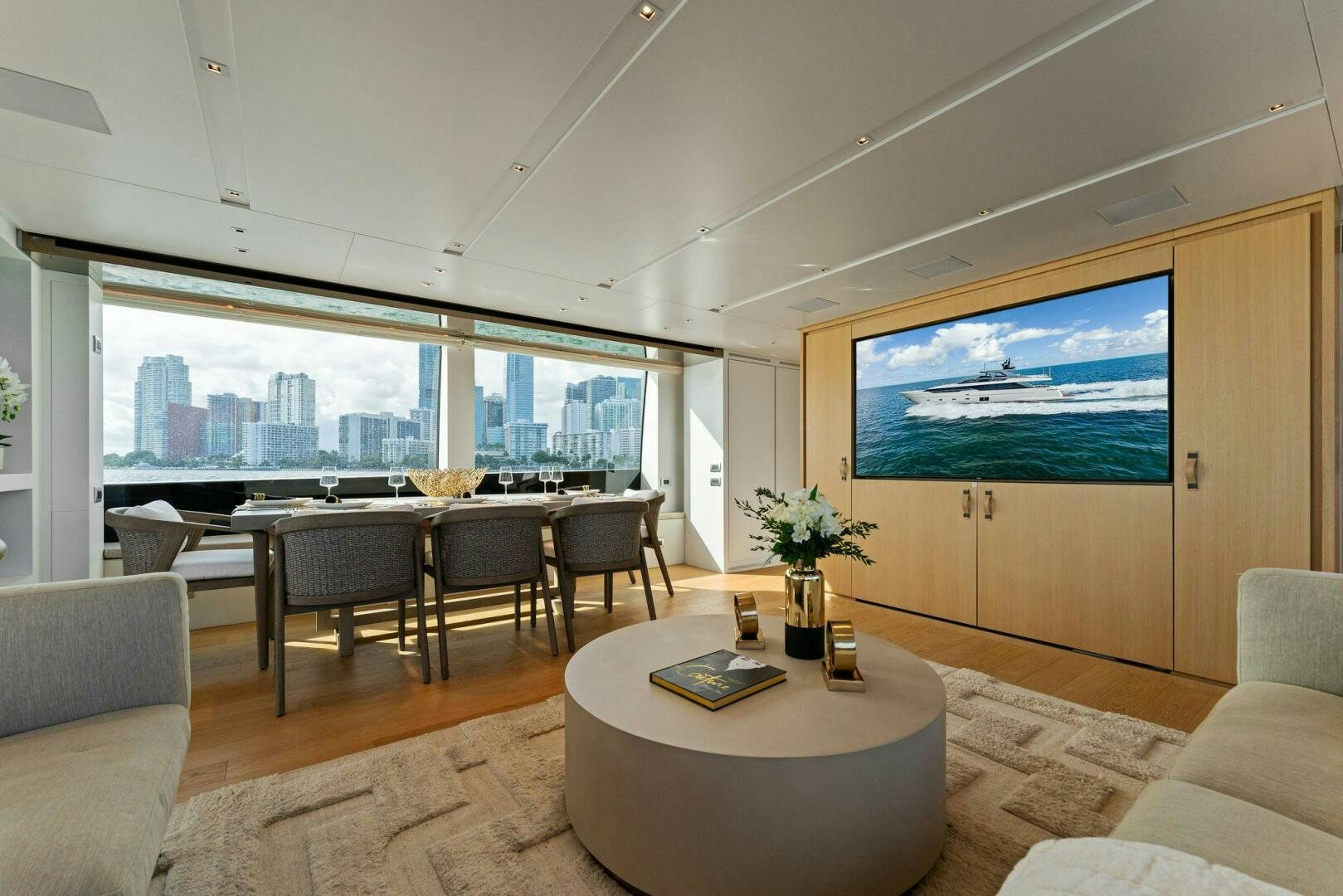 a living room with a large window aboard GATSBY Yacht for Sale