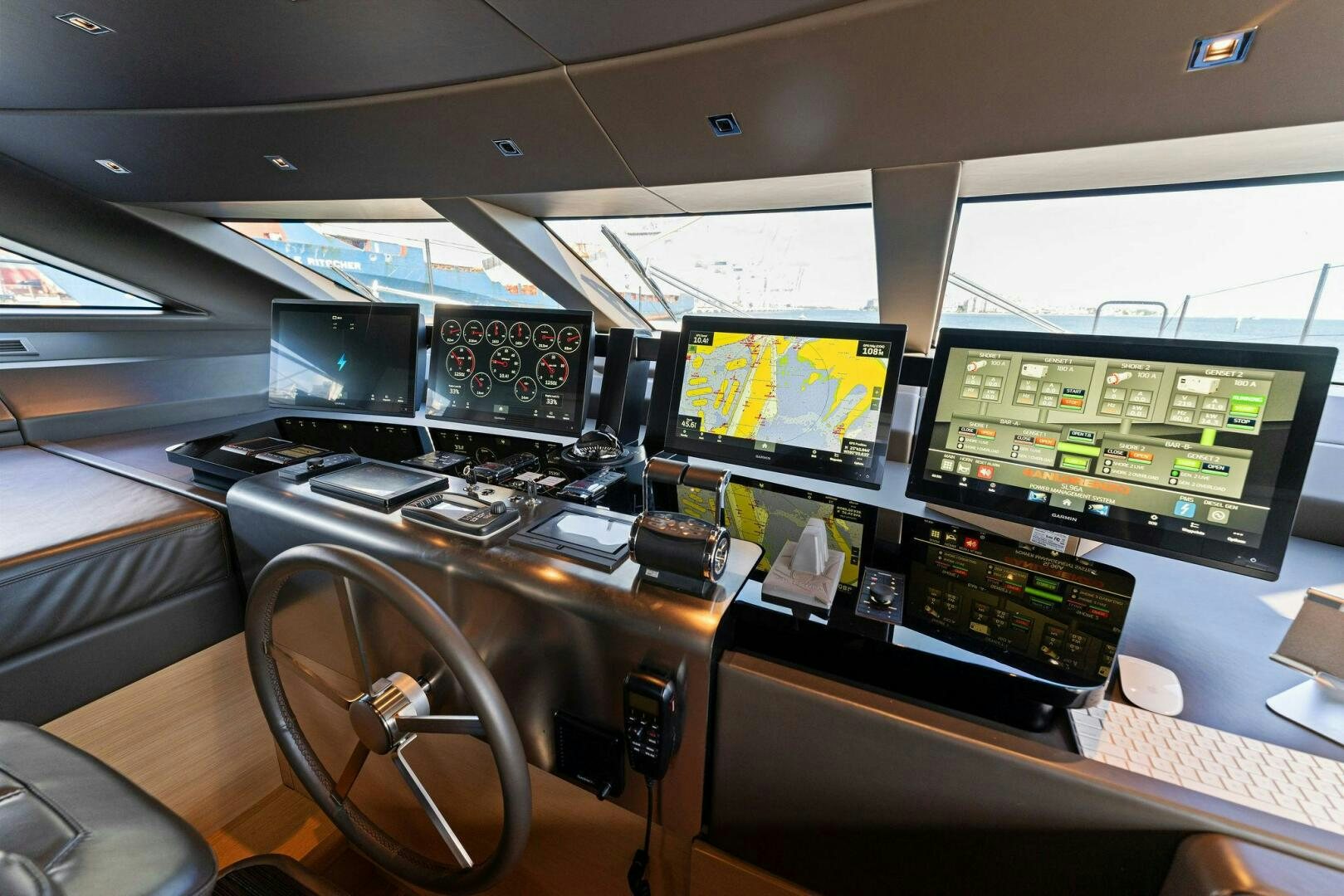 a control room with many monitors aboard GATSBY Yacht for Sale