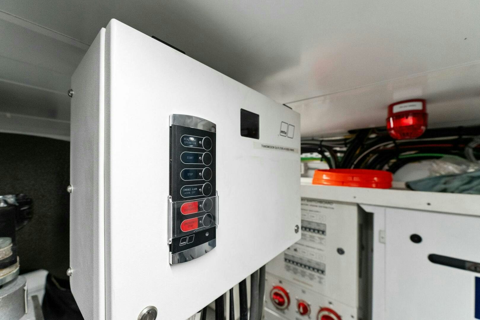 a white machine with a black control panel aboard GATSBY Yacht for Sale