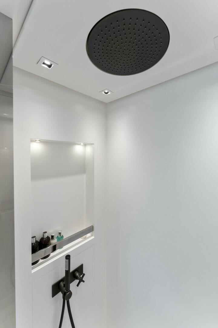 a mirror hangs from a wall aboard GATSBY Yacht for Sale