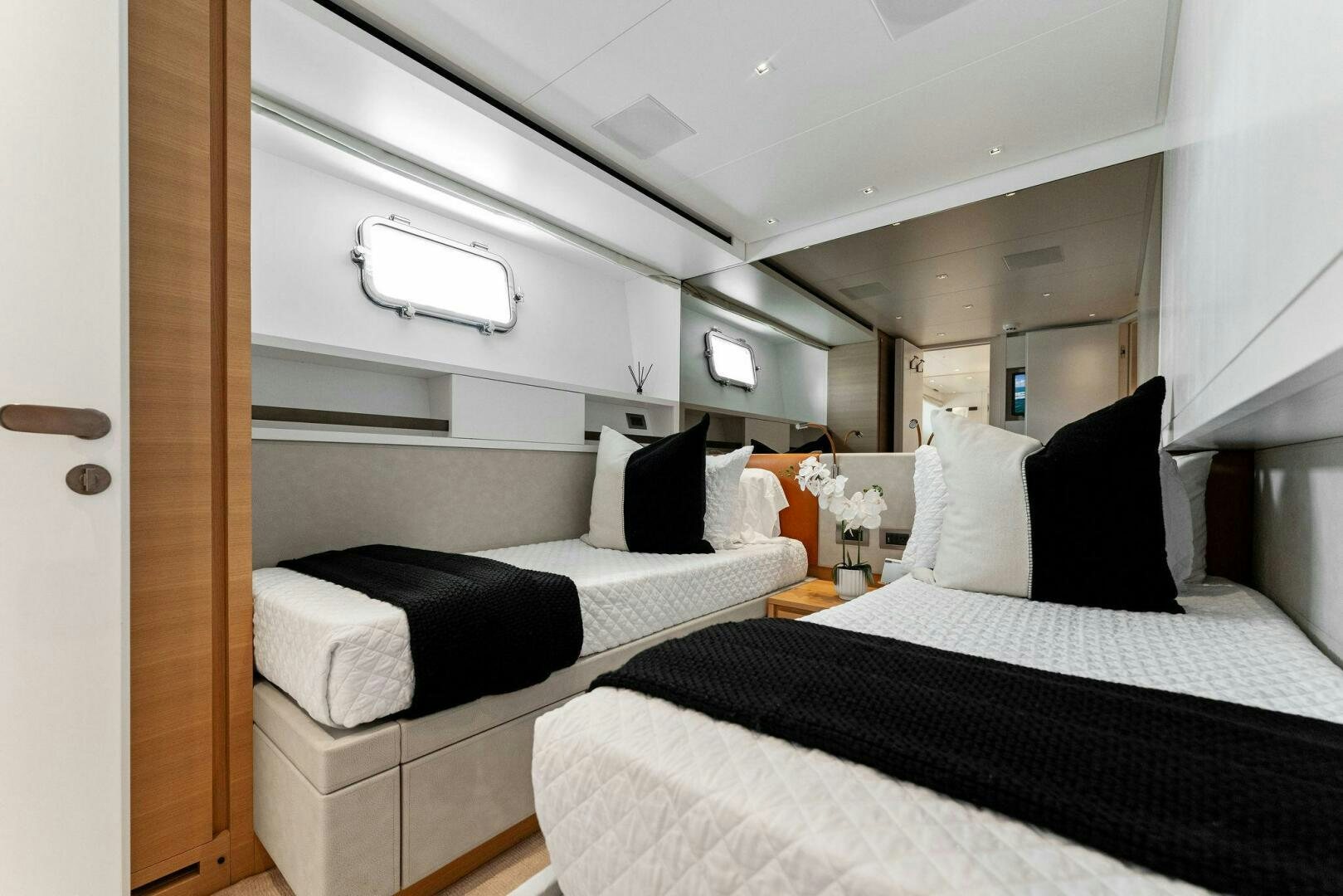 a couple of beds in a room aboard GATSBY Yacht for Sale