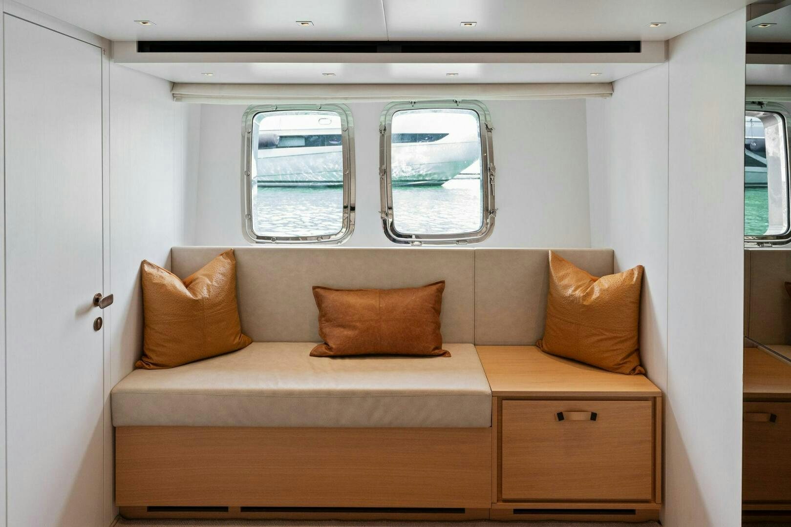 a couch in a room aboard GATSBY Yacht for Sale