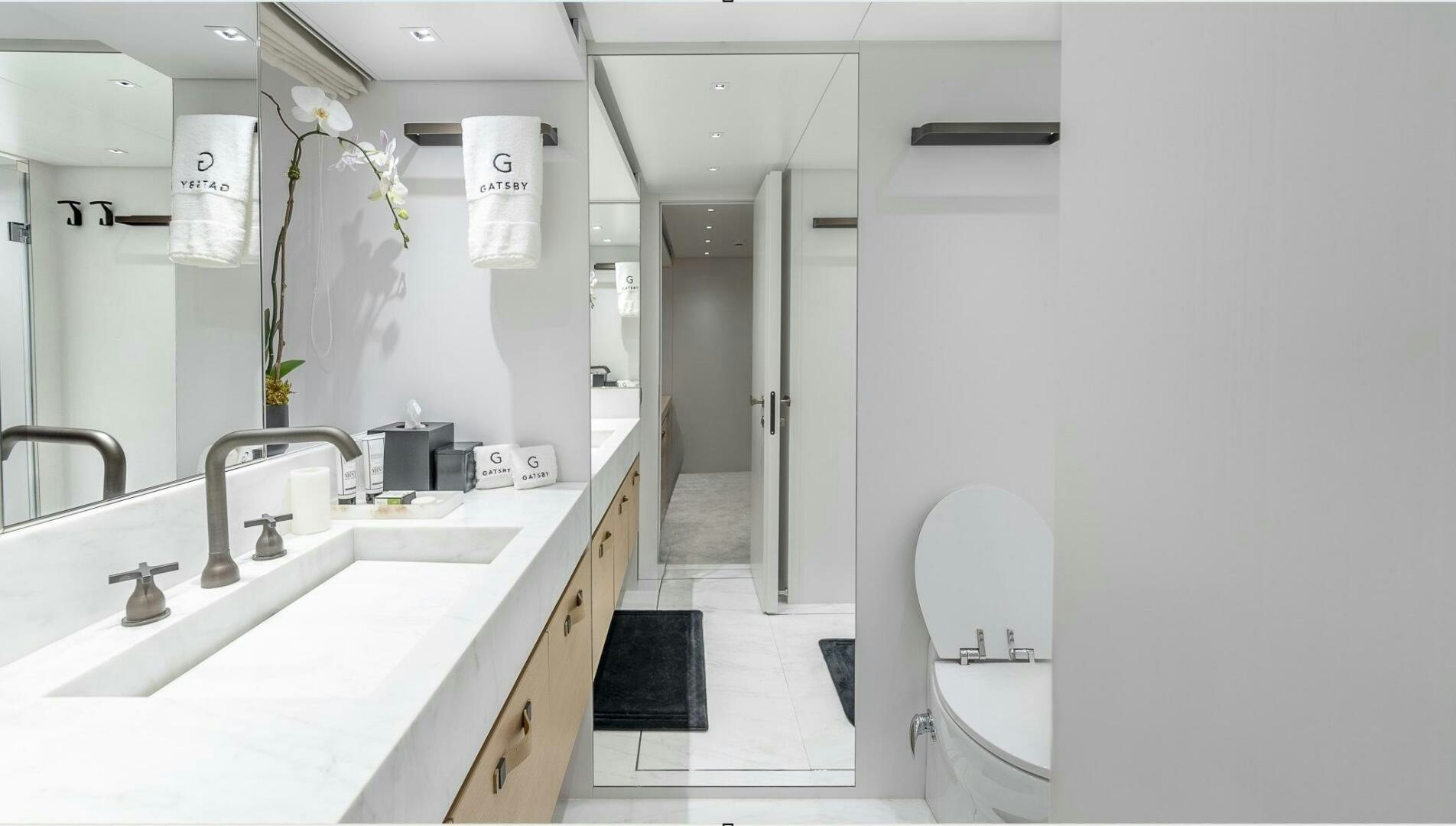 a bathroom with a sink and a toilet aboard GATSBY Yacht for Sale
