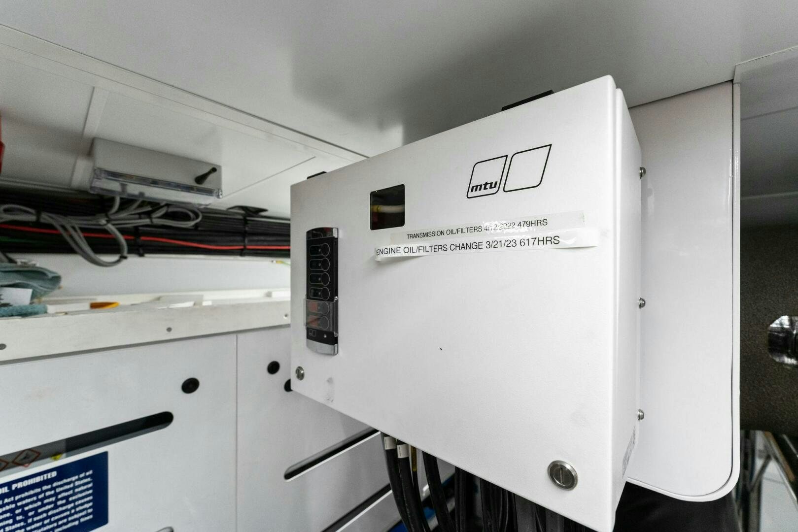 a white machine with a screen aboard GATSBY Yacht for Sale