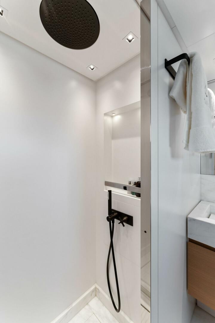 a bathroom with a sink and a mirror aboard GATSBY Yacht for Sale