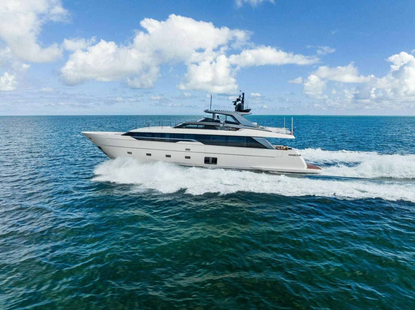 a white yacht in the water aboard GATSBY Yacht for Sale