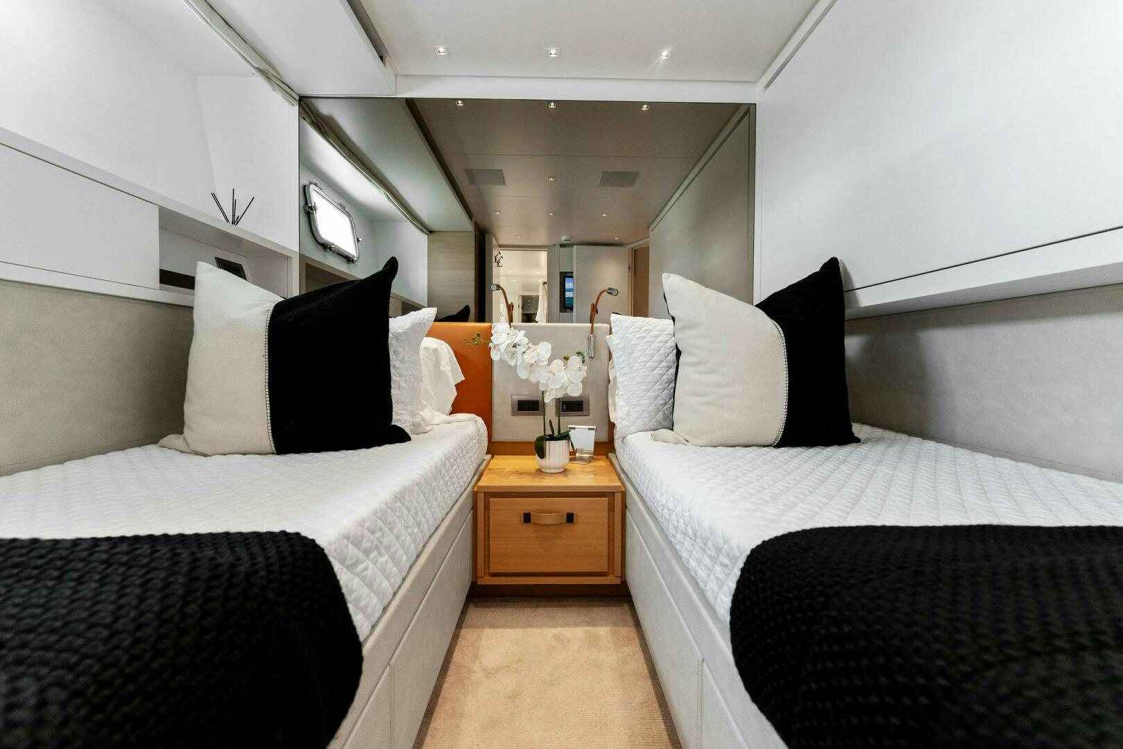 a room with two beds aboard GATSBY Yacht for Sale