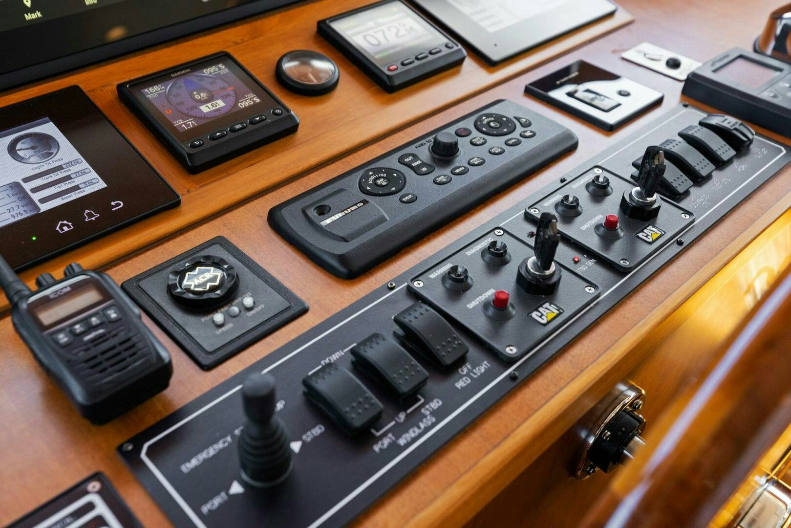 a table with game controllers and games aboard SUNZSET Yacht for Sale
