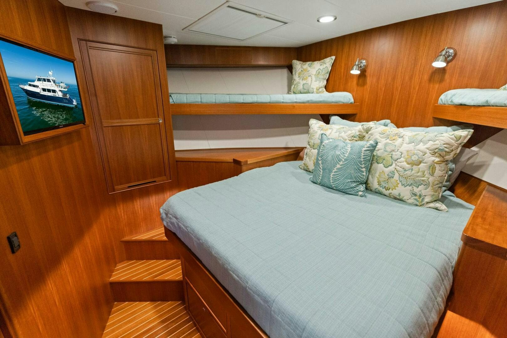 a bed in a room aboard SUNZSET Yacht for Sale