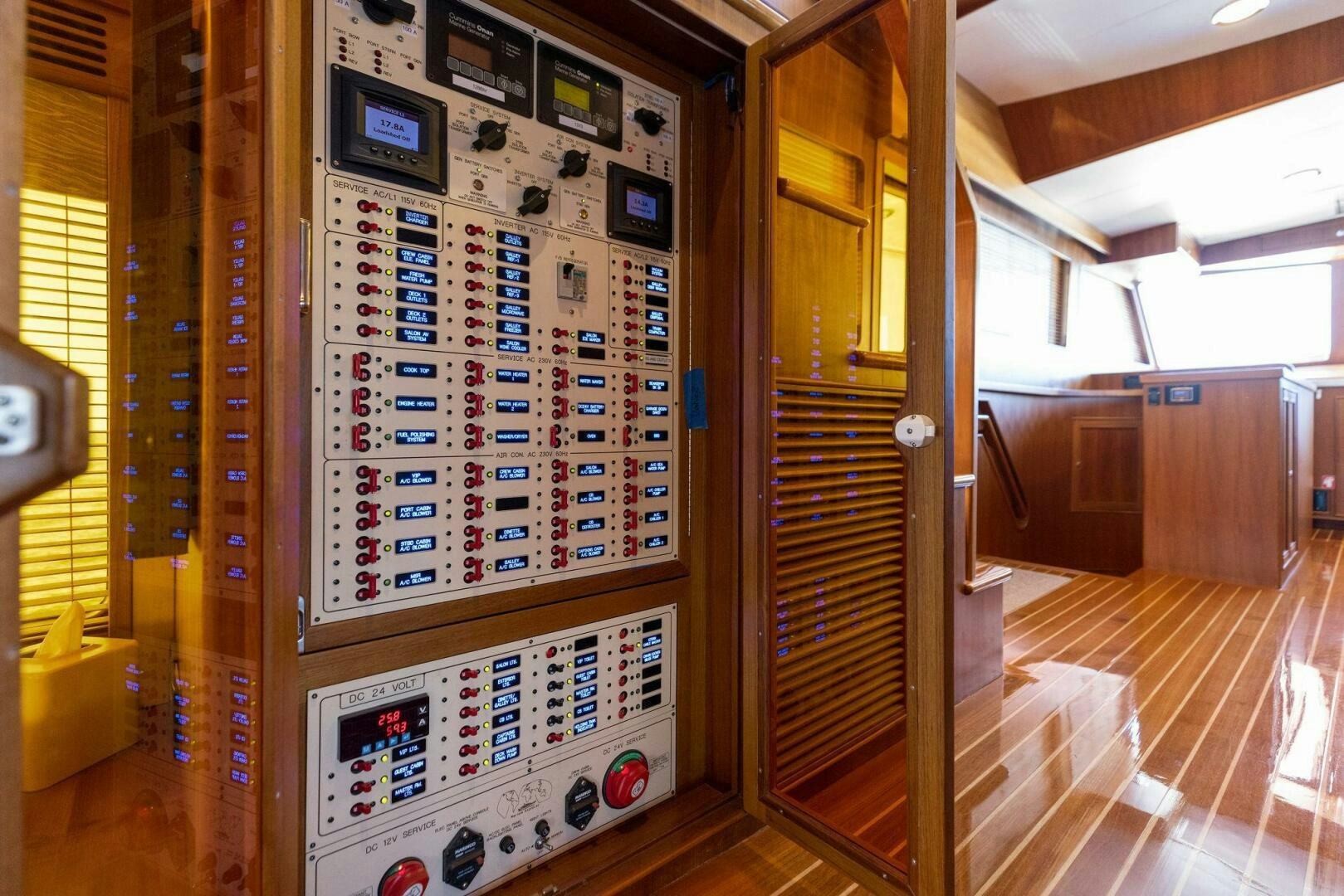 a room with a large display of electronics and a large screen aboard SUNZSET Yacht for Sale