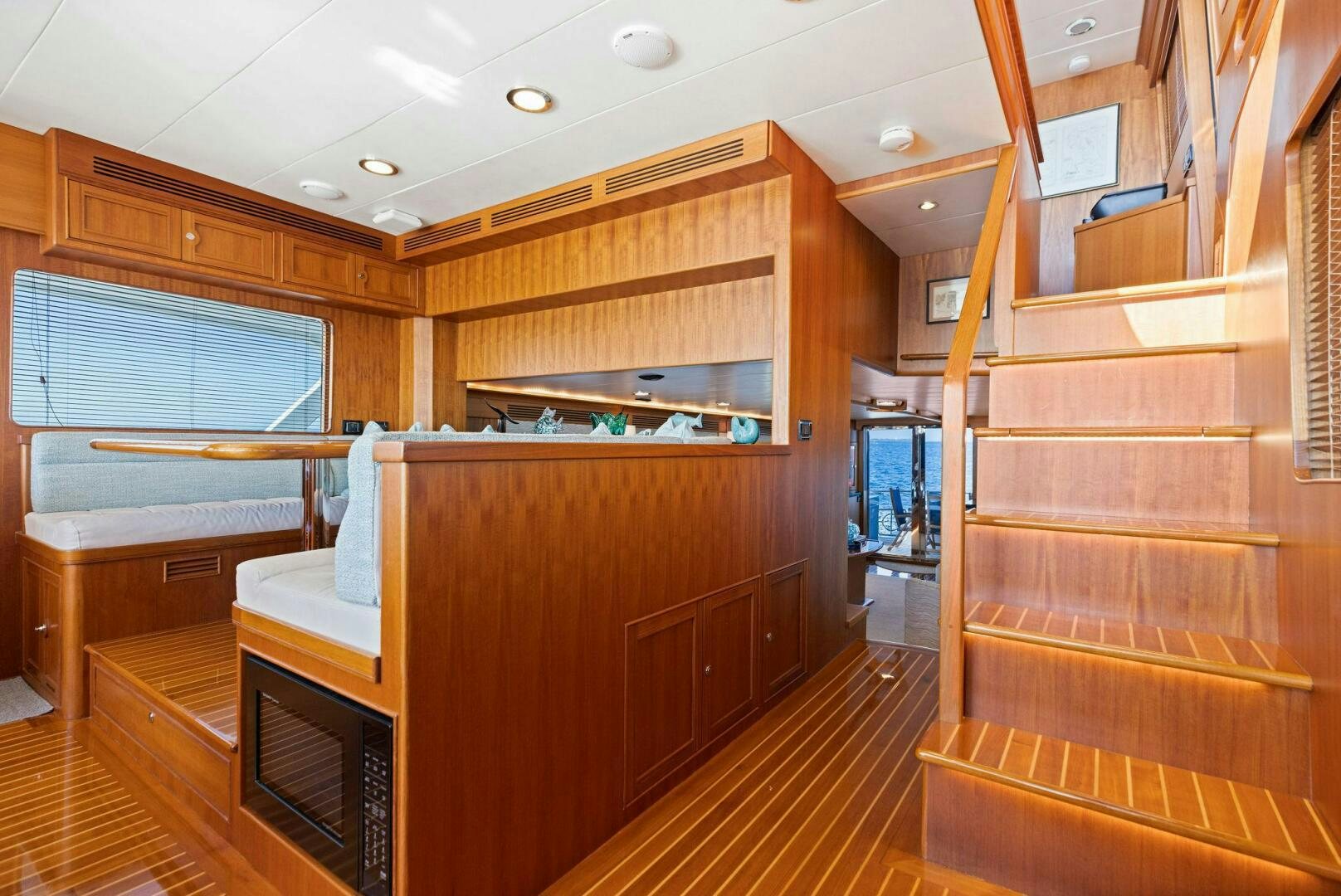 a room with wooden cabinets aboard SUNZSET Yacht for Sale